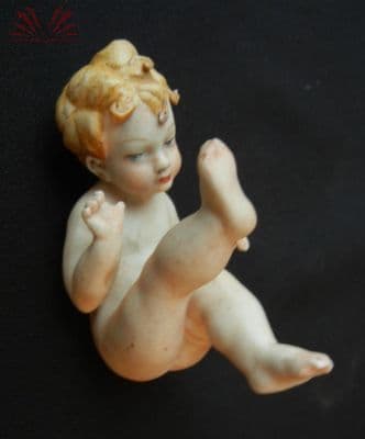 Figura de bebê — Não identificado