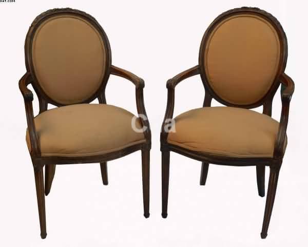 Par de poltronas de madeira lavrada — Não identificado