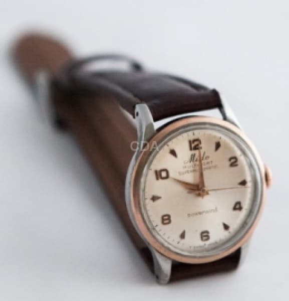 Relógio Mido (suiço) em aço e ouro (12 k chapa no bezel e na coroa),pulseira em couro legítimo, vidr — Não identificado