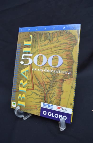 Livro Brasil 500 anos de Cultura - O Globo - 1999 -124 páginas, medindo 28 X 21,5 cm. De Portugal Ch — Não identificado