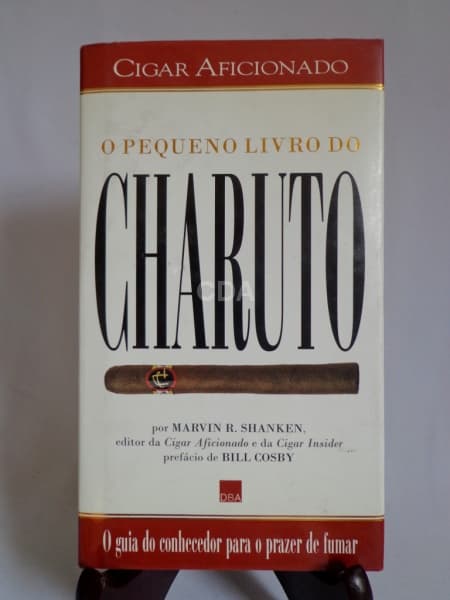 LIVRO " O PEQUENO LIVRO DO CHARUTO " POR MARVIN R. SHANKEN. CAPA DURA COM 200 PÁG., EM PORTU — Não identificado