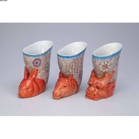 Conjunto de três floreiros de porcelana — Não identificado